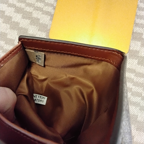 Coach bundle featuring a mix of classic signature and leather pieces - Picture 10 of 10